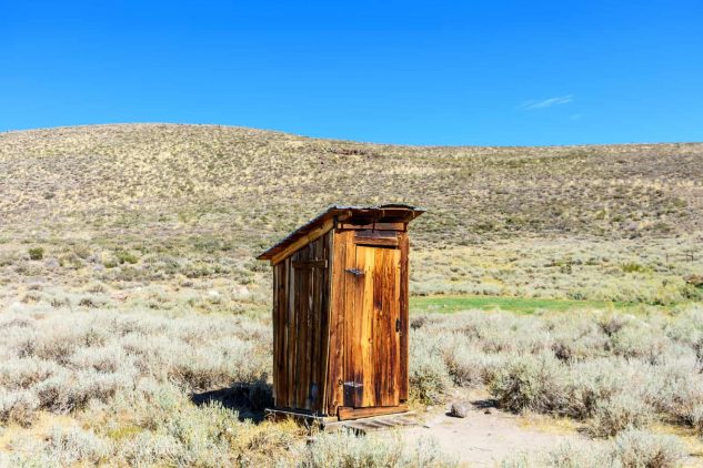 outhouse history old west